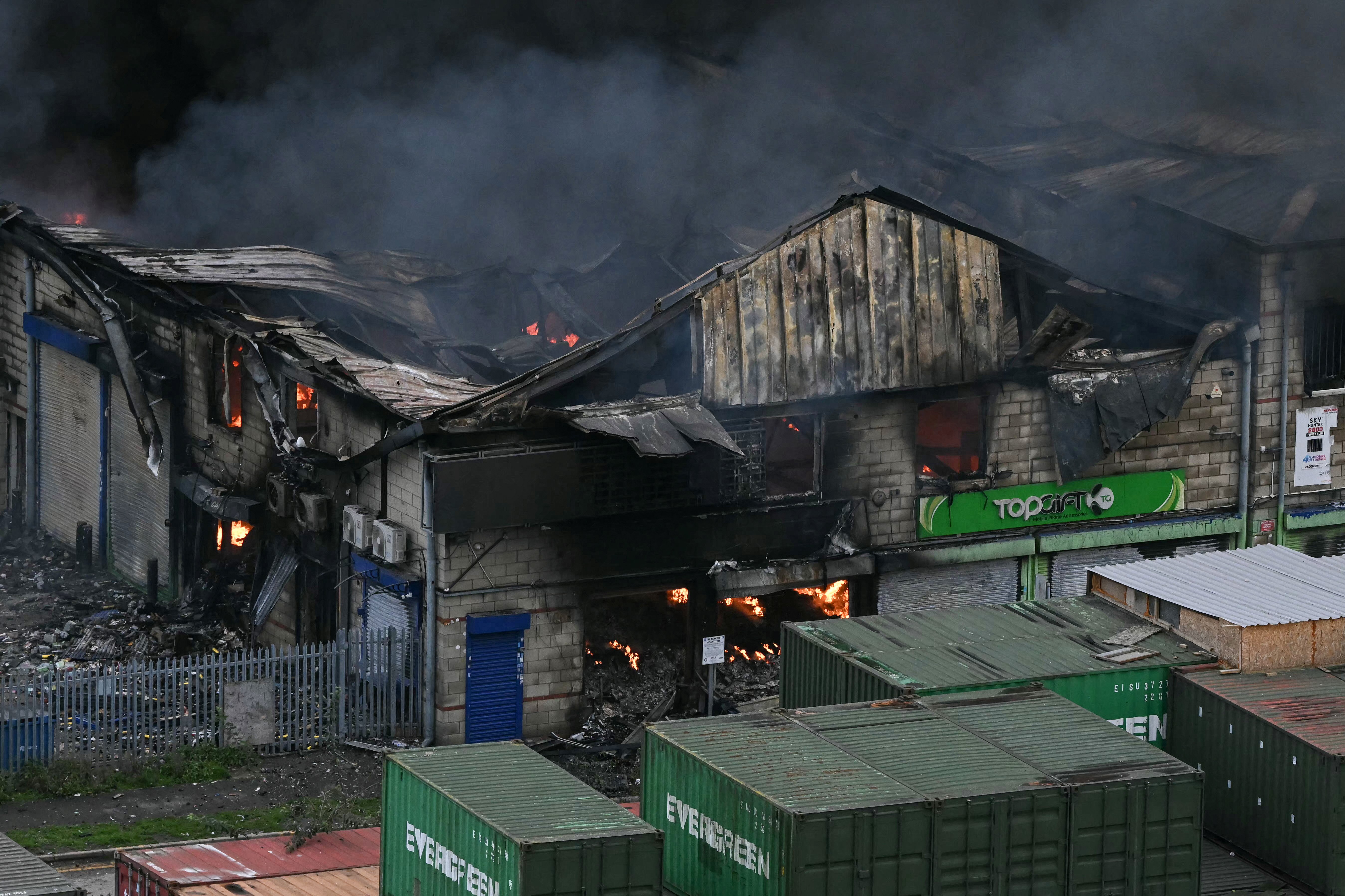 Massive warehouse blaze erupts in west London, triggering explosions